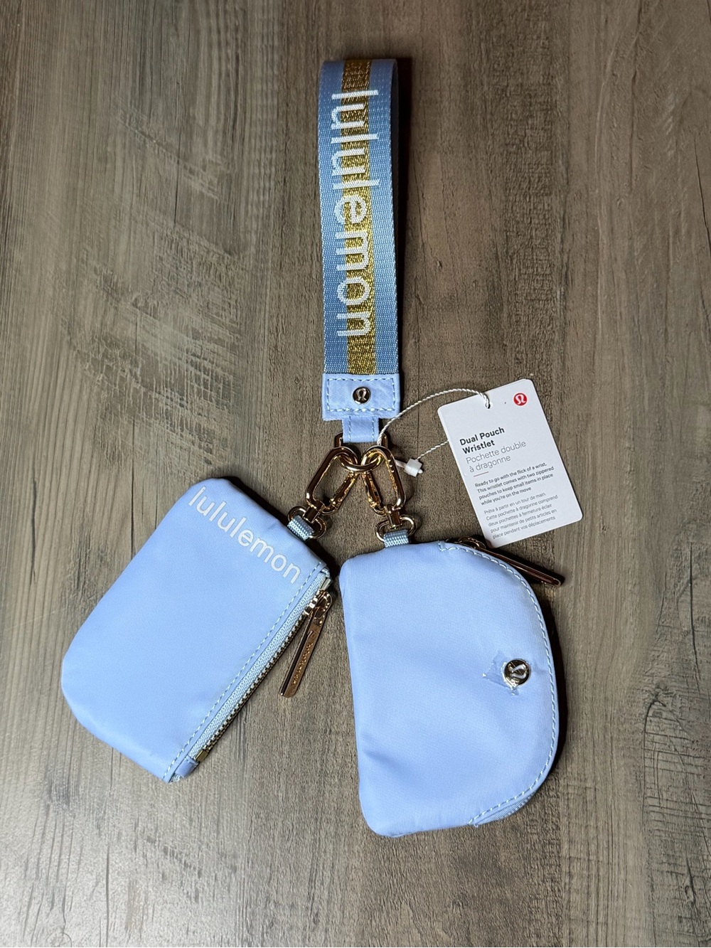 RARE ✨🩵 NWT Lululemon Dual Pouch Wristlet *Baby blue and gold wordmark*